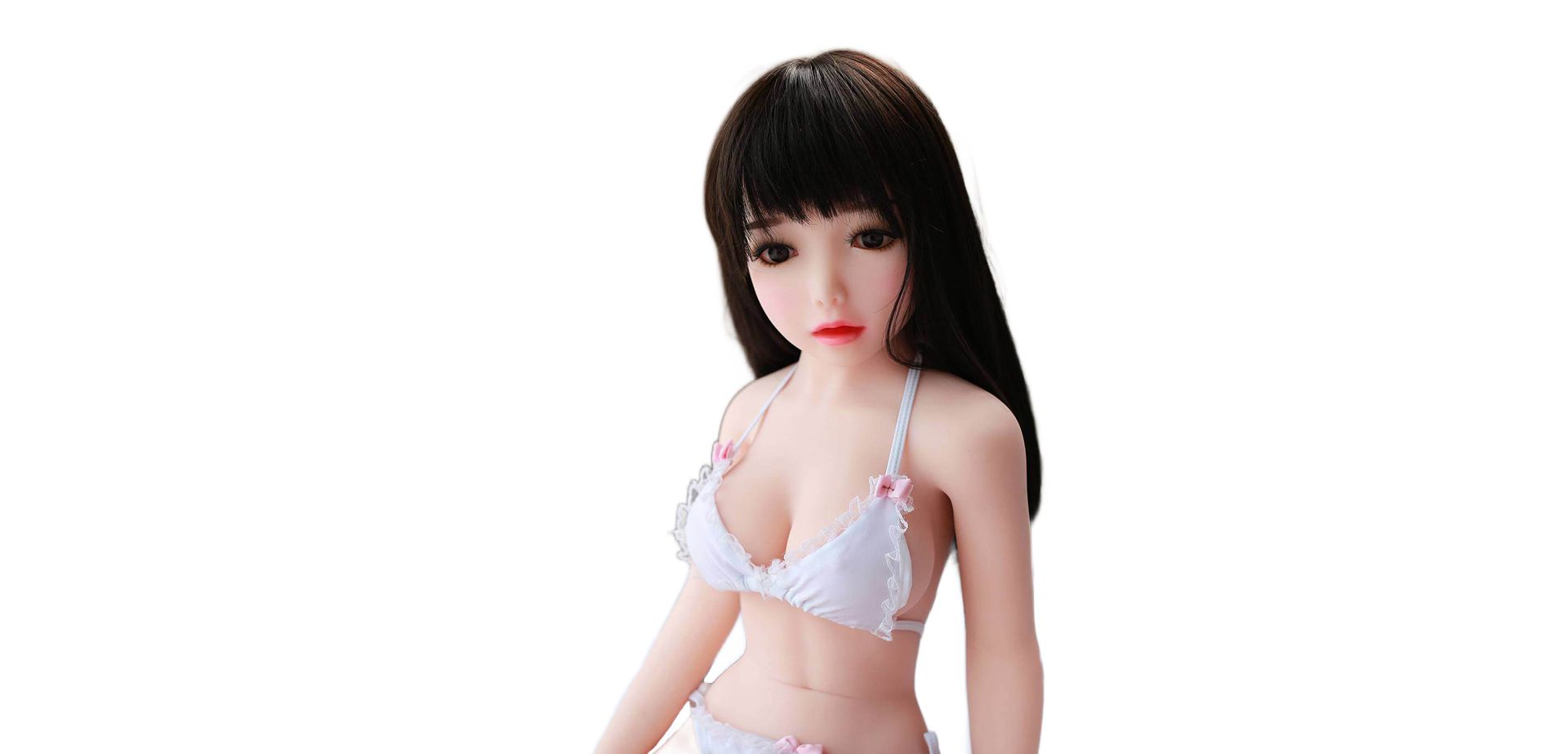 Dark-haired 100 cm doll.