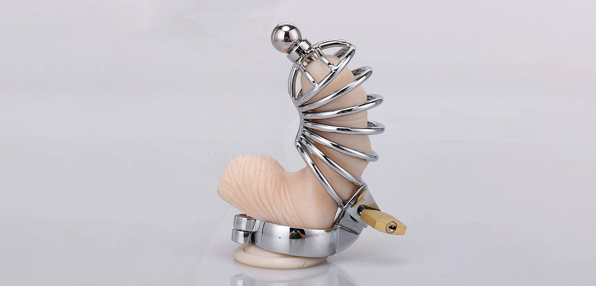 Example how to put on a chastity cage.