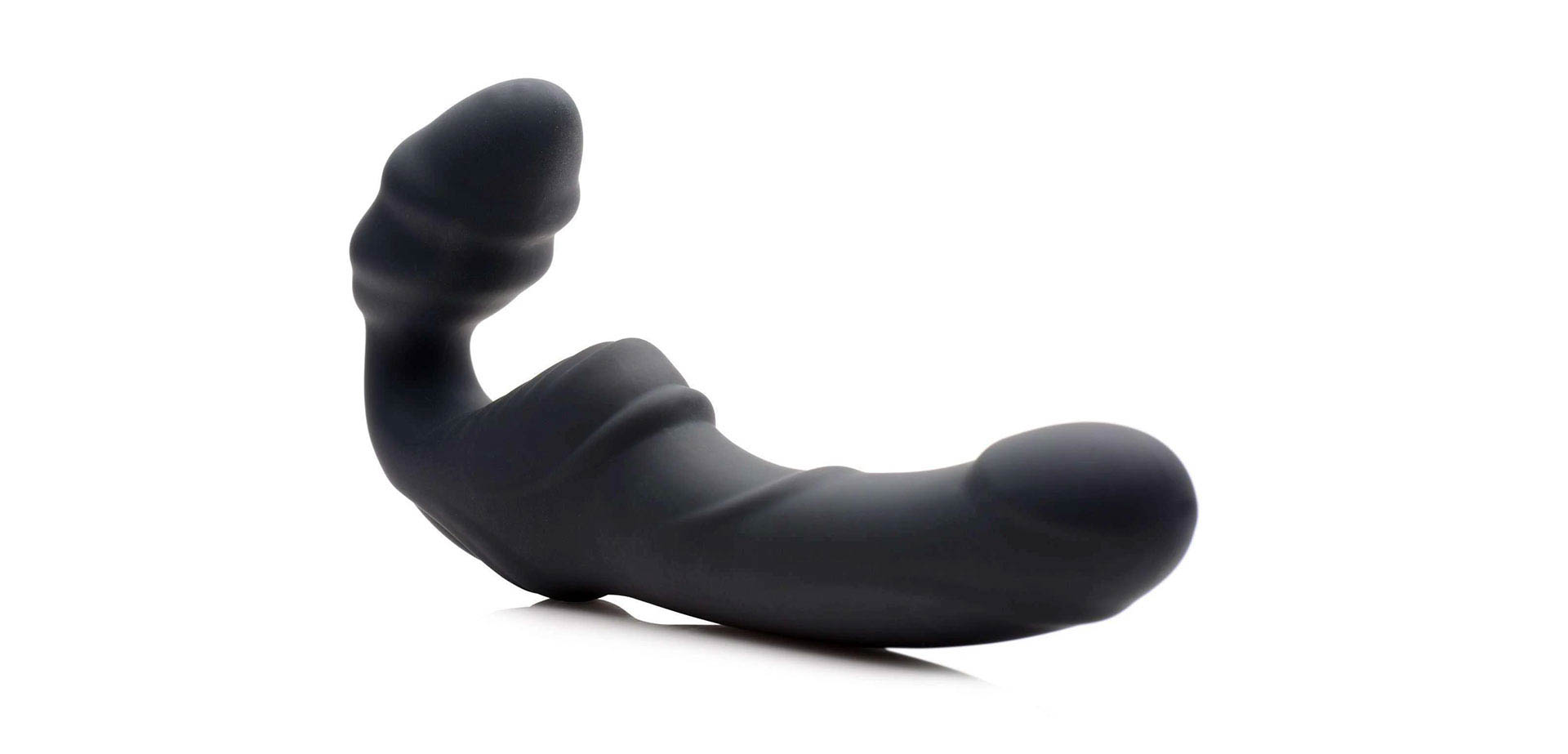 Slim Rider Ribbed Vibrating Silicone Strapless Strap On.